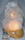 Image of clear quartz cluster on wood base