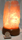 Image of natural rose quartz on wood base