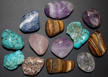 Image of assorted mineral magnets, tumbled stone