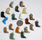 Image of gemstone pendants shaped as boots