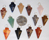 Image of gemstone pendants shaped as arrowheads