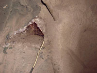 Image of the excavation of an amethyst geode.